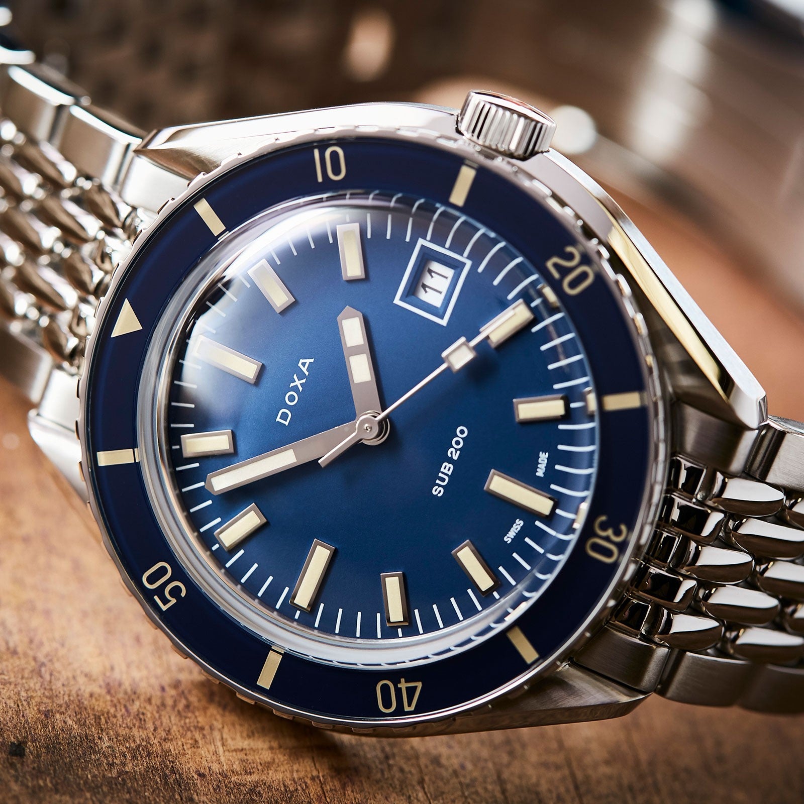 DOXA MEN'S SILVER TONE CASE BLUE DIAL AUTOMATIC WATCH