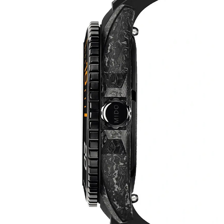 Close-up of a black watch with a detailed case on a white background