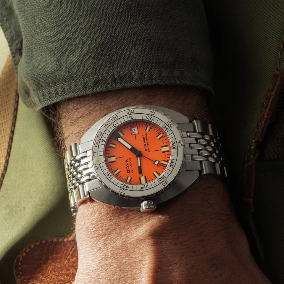 DOXA MEN'S SILVER TONE CASE ORANGE DIAL AUTOMATIC WATCH