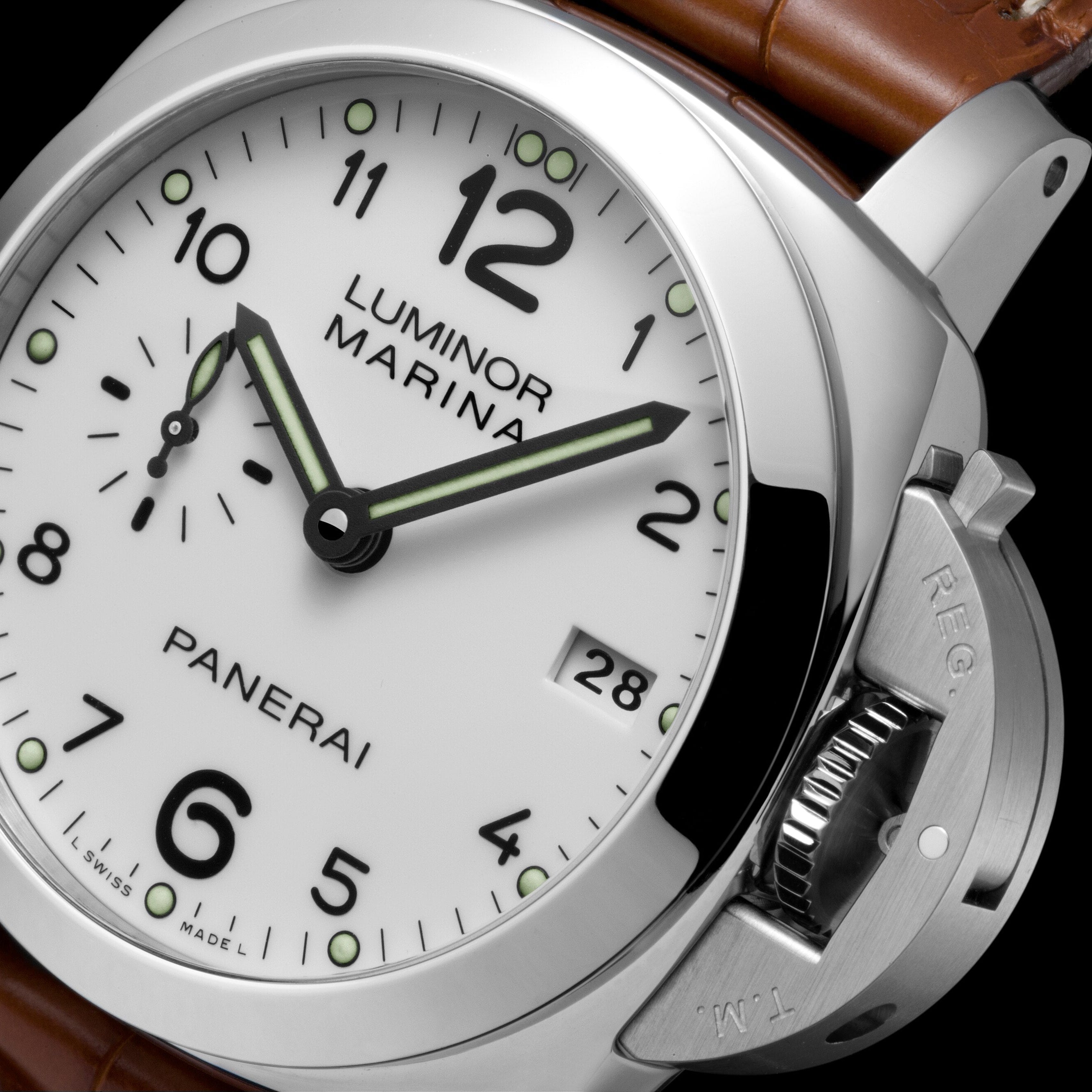 Panerai Luminor Marina watch with brown leather strap on a black background