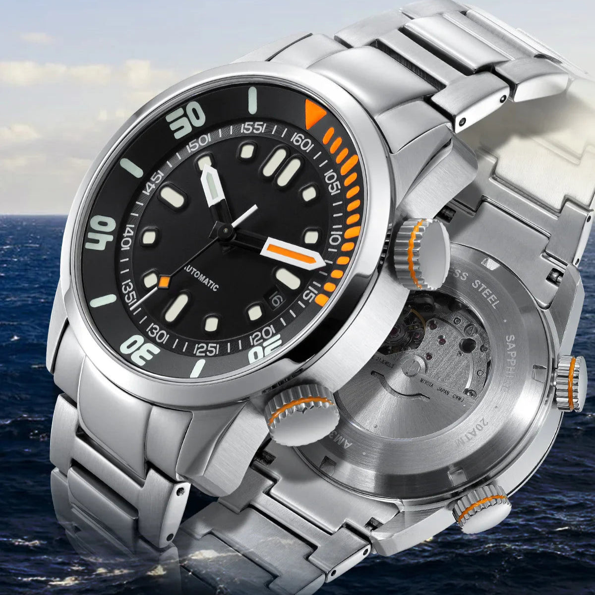 Silver watch with black dial and orange accents on a background of water and sky