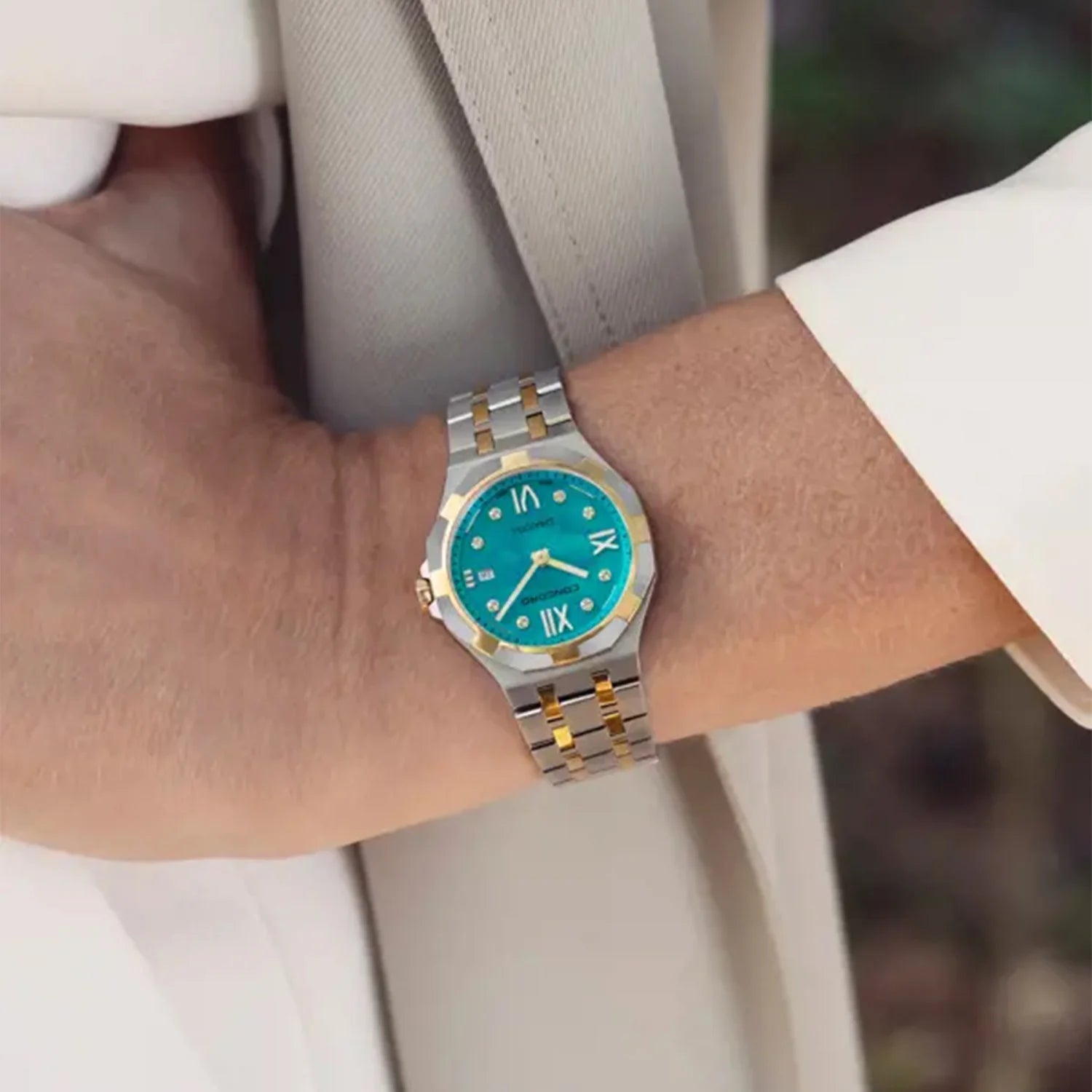 CONCORD WOMEN'S 2 TONE CASE TURQUOISE MOP DIAL QUARTZ WATCH
