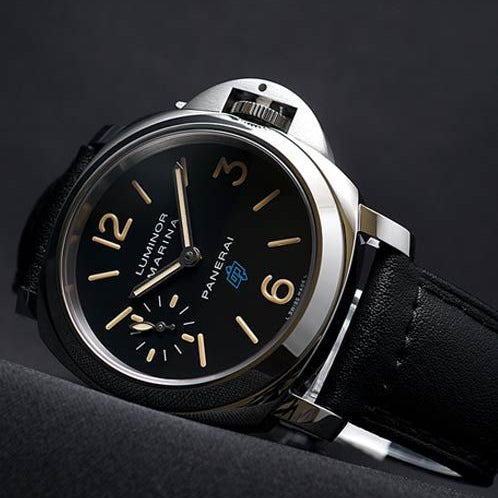 Panerai watch with black dial and leather strap on a dark background