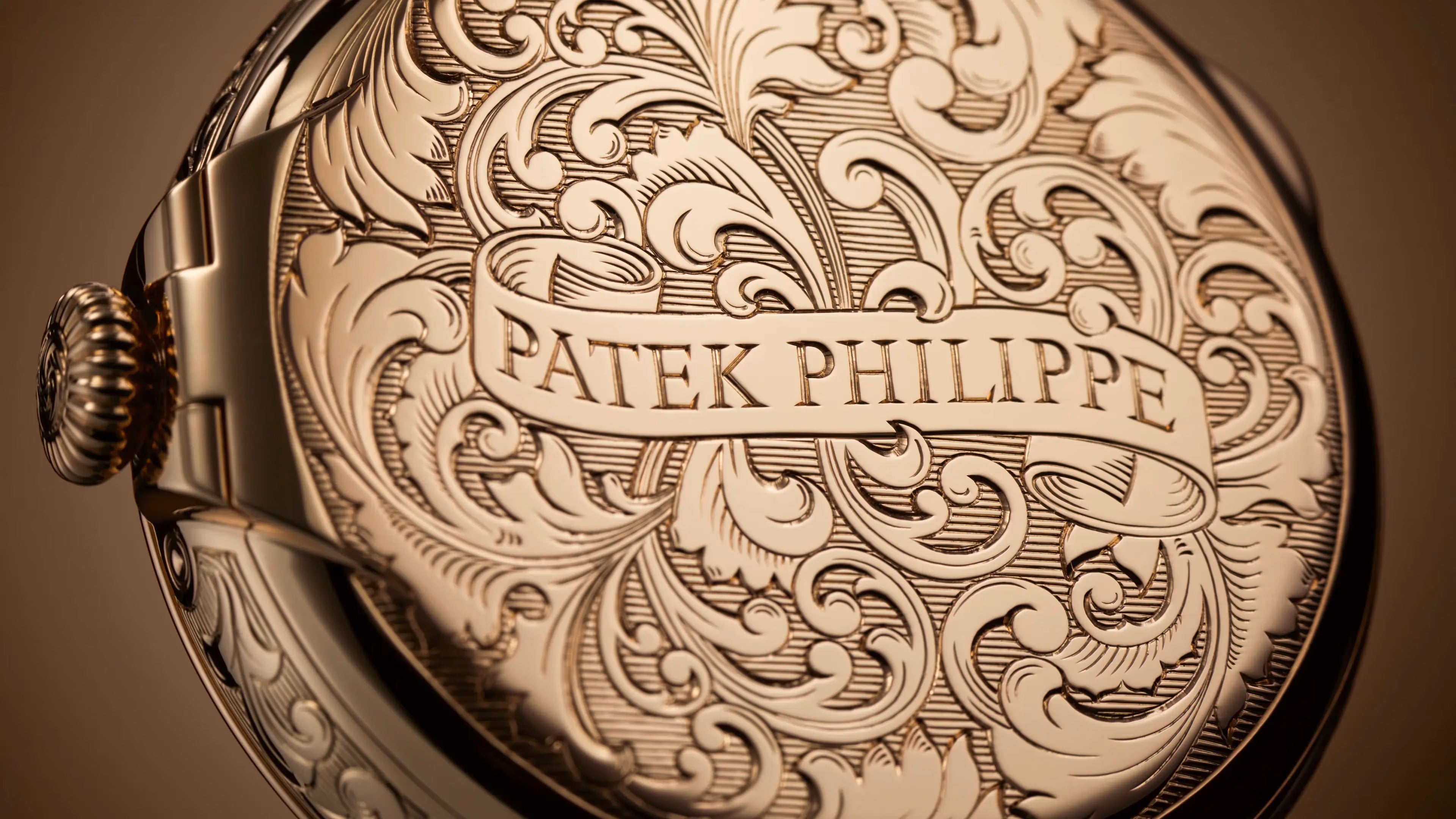 "Eternal Engraving: A Symphony of Rose Gold and Timelessness in the Patek Philippe 5160/500R”