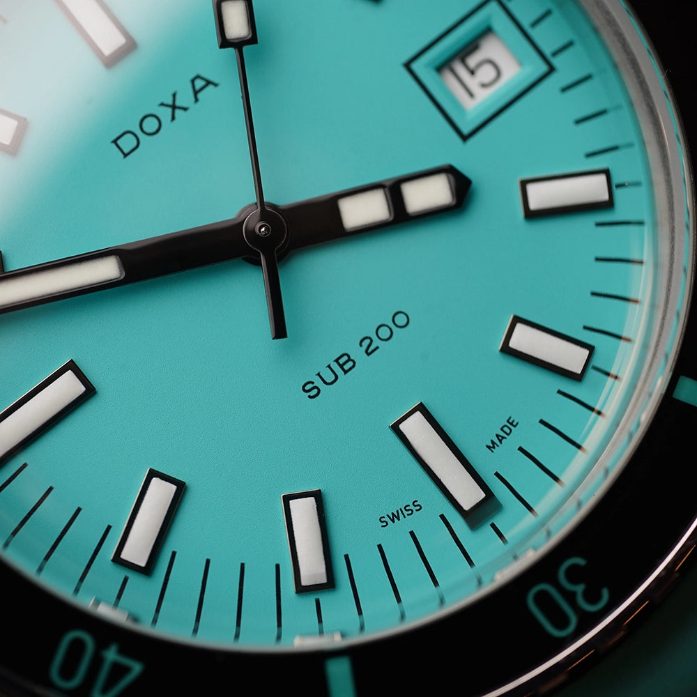 DOXA MEN'S SILVER TONE CASE TORQUOISE DIAL AUTOMATIC WATCH