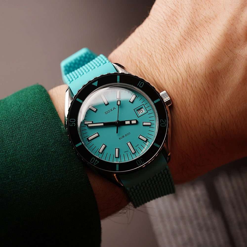 DOXA MEN'S SILVER TONE CASE TORQUOISE DIAL AUTOMATIC WATCH