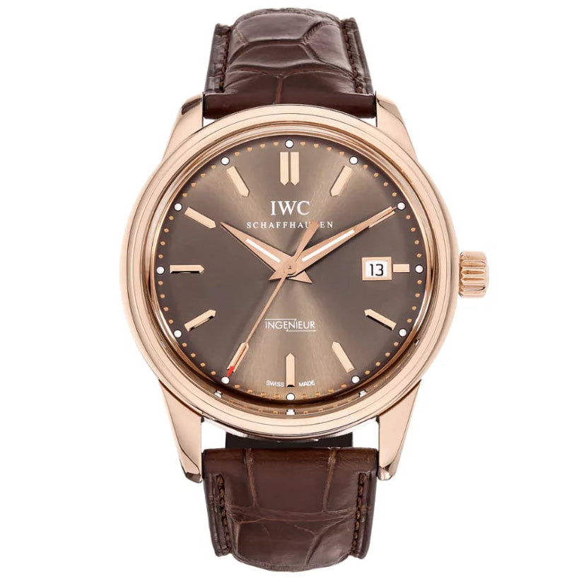 IWC watch with brown leather strap and brown dial on a white background