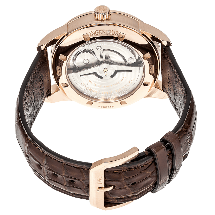 Luxury watch with brown leather strap and rose gold case on white background