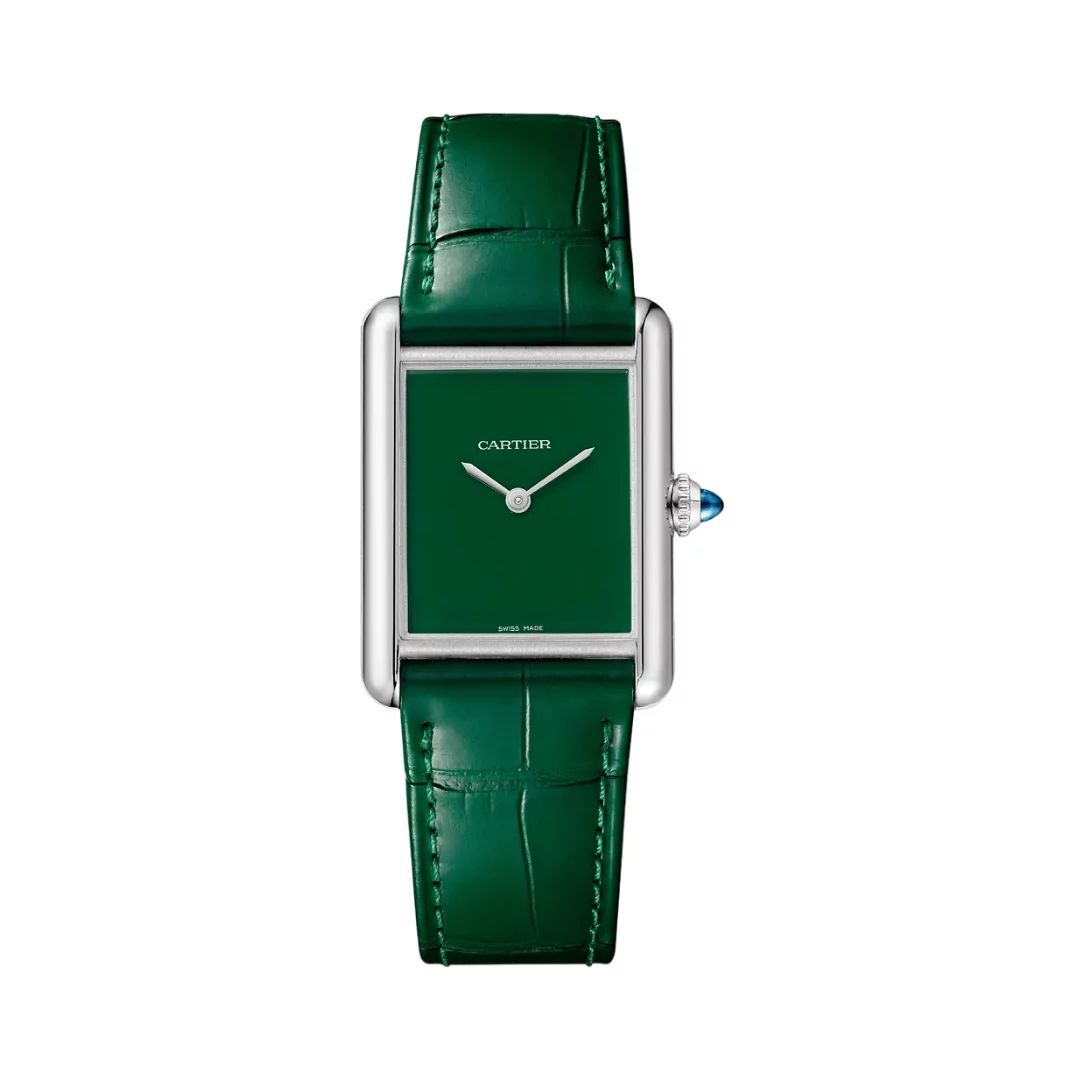 Green watch with silver case and green strap on a white background