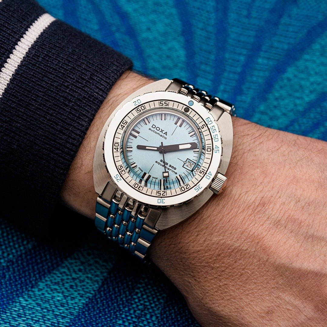 DOXA MEN'S SILVER TONE CASE TORQUOISE DIAL AUTOMATIC WATCH