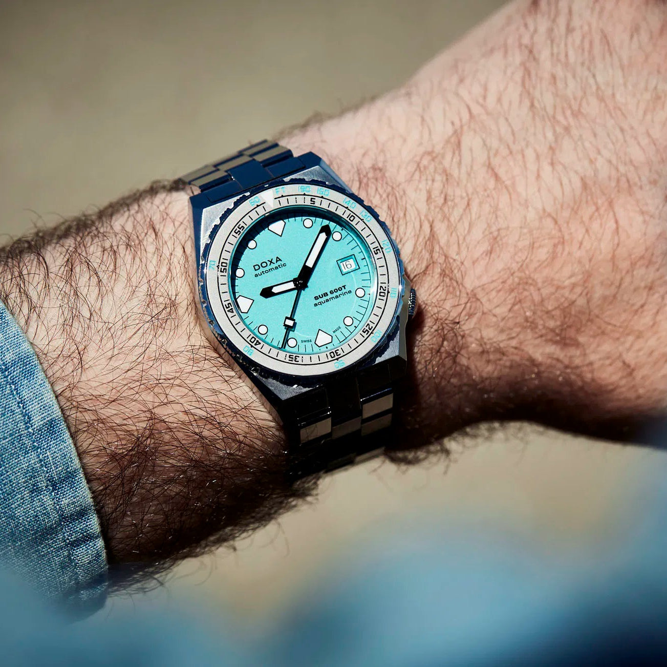 DOXA MEN'S SILVER TONE CASE BLUE DIAL AUTOMATIC WATCH