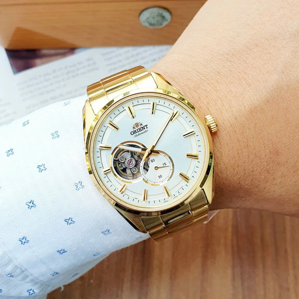 ORIENT MEN'S CONTEMPORARY AUTOMATIC SEMI-SKELETON WATCH