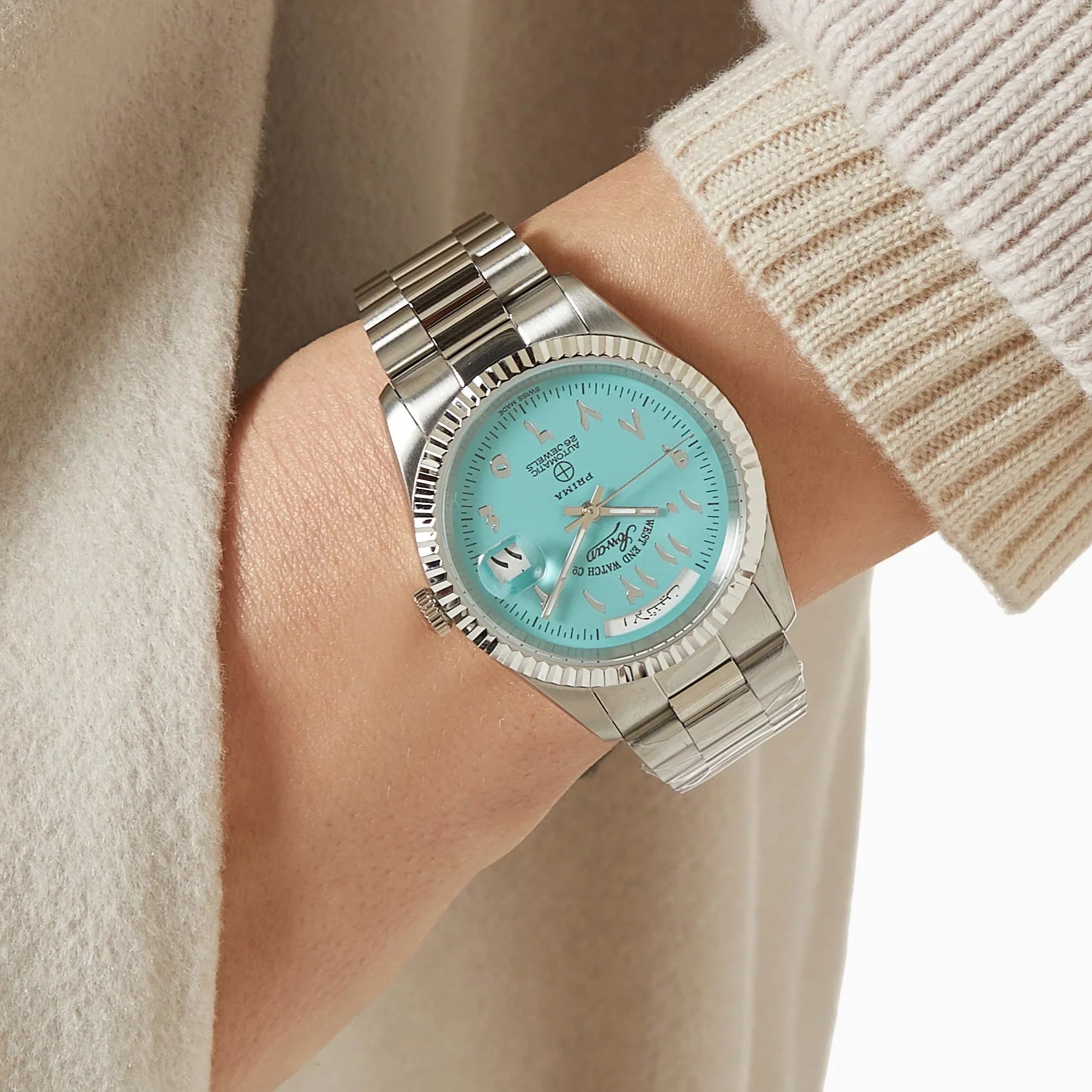 WEST END WOMEN'S SILVER TONE CASE TURQUOISE DIAL AUTOMATIC WATCH