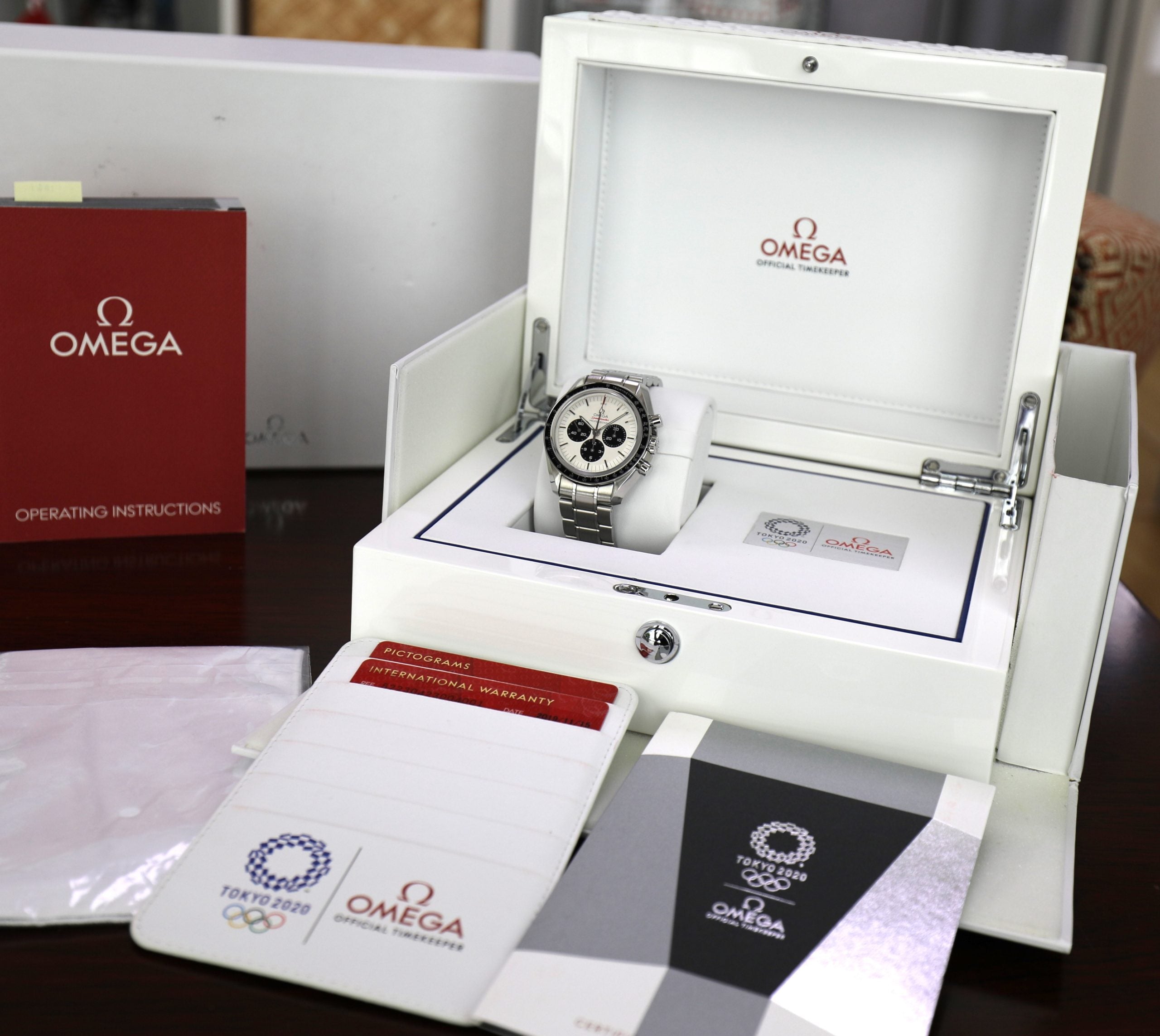 Omega Speedmaster 2020 Tokyo – Panda Dial – 42mm – Limited Edition – Unworn Mint – Full Set - Azzam Watches 